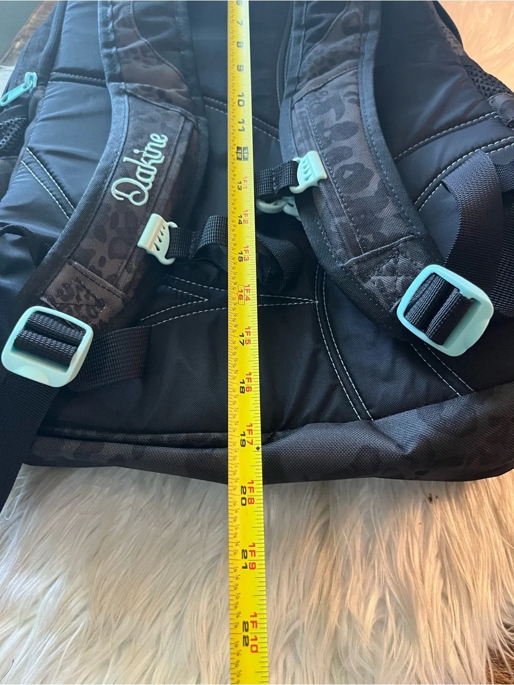 Dakine Black Leopard-Print Backpack with Teal Zipper Accents